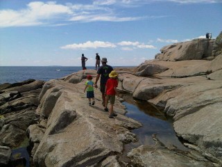 Choosing our picnic spot on the rocks